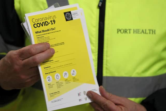 File photo dated 28/02/20 of leaflets which form part of the public awareness campaign for COVID-19 at Dublin Airport, as the second case of coronavirus has been confirmed on the island