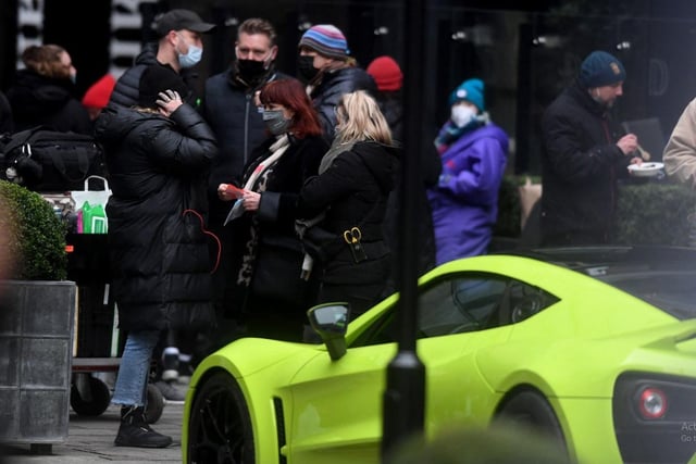 A very expensive looking luminous green Lamborghini was also spotted parked up on set. Picture: Simon Hulme.