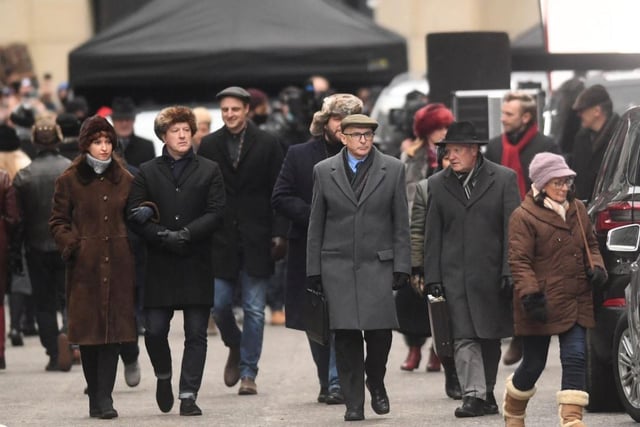 Leeds City Centre has been transformed to look like Russia for the filming with cast members dressed in traditional Russian headwear. Picture: Simon Hulme.
