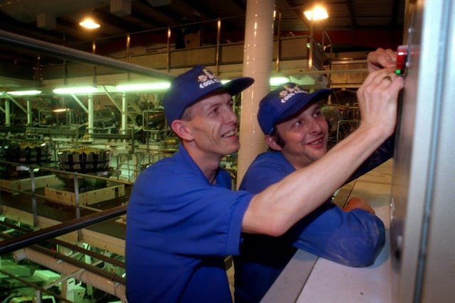 Flavour operators Peter Buchanan and Lee Shallcross perform the big switch on of a new air conditioning unit at Benson's Crisps, 1998