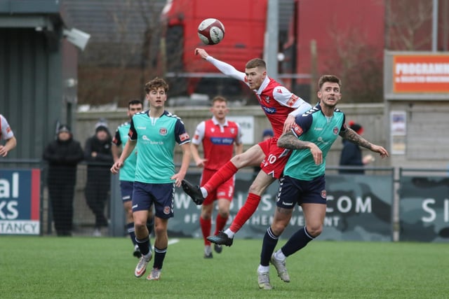 Kieran Glynn looks to win a header for Boro in their 1-1 draw with Hyde United

Photo by Morgan Exley