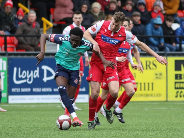 Boro midfielder Simon Heslop keeps track of a Hyde player