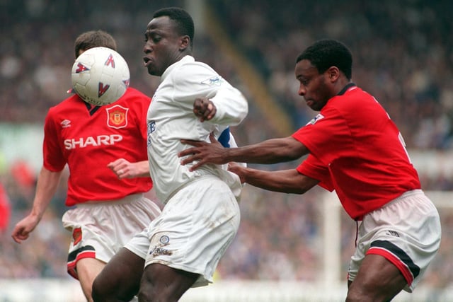 Ton y Yeaboah shields the ball from Manchester United's Paul Parker.