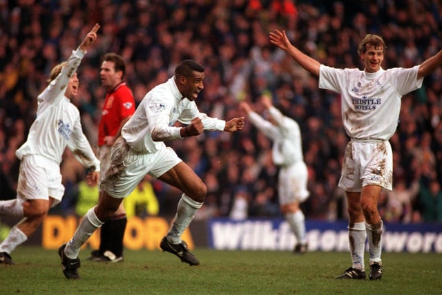 All smiles as Brian Deane celebrates his goal with Tomas Brolin and Richard Jobson.