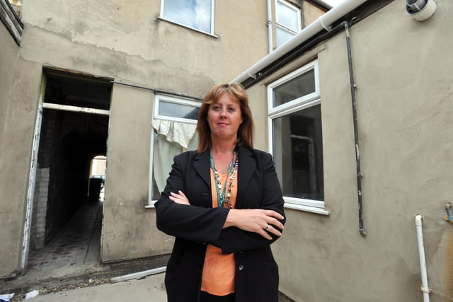 Jo Hodges, the city council's senior neighbourhoods enforcement officer, outside a property in Cromwell Road, which had fallen into a bad condition after being a HMO, and the landlords were prosecuted by the council in court in 2011.