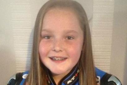 Chloe, aged 13, in her racing gear.
