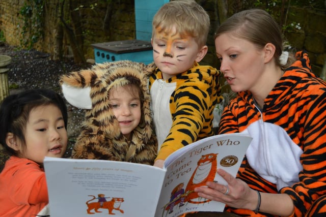 Pupils at St John's Priory School read a book during Wold Book Day (Submitted photo from the school)