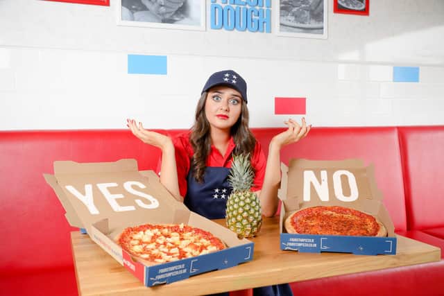 A ‘pizza border poll’ carried out by Four Star Pizza (FSP) for National Pineapple Day (Saturday June 27) reveals that pineapple is more popular with pizza lovers in the Republic of Ireland than in Northern Ireland. Pictured is Abbie Parkinson from Four Star Pizza