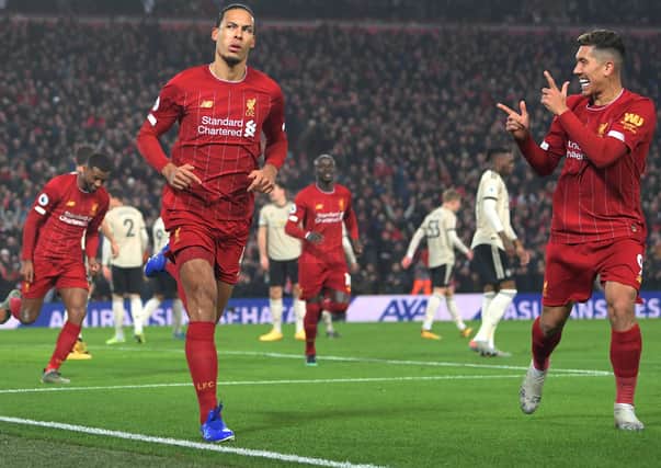 Virgil Van Dijk celebrates his goal against Manchester United. Pic by Getty.