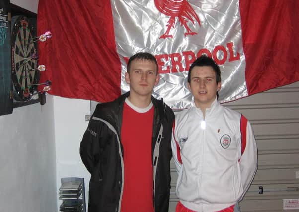 News Letter motorcycle correspondent and Liverpool fan Kyle White with brother Christopher