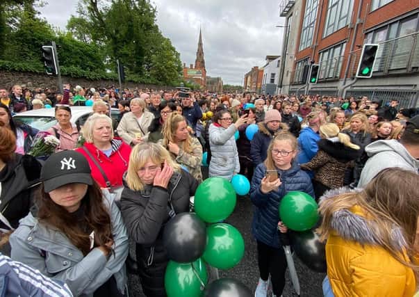 Crowds attend a candle lit vigil in memory of Noah Donohoe in North Belfast this evening.  Photo: PA/PA Wire