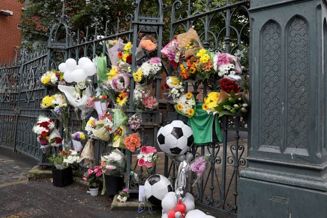 PACEMAKER PRESS BELFAST
28/6/2020
Flowers on the gate of Saint Malachy's College as people pay tribute to 14 year old Noah Donohoe who was found dead yesterday after going missing last Sunday in the North Belfast area. 
Photo Pacemaker Press