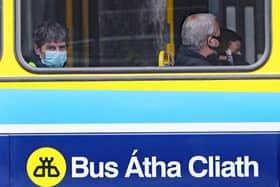People riding a bus in Dublin wear face coverings, which are now compulsory on public transport, as Ireland enters phase three of Covid-19 lockdown restrictions. Photo: Niall Carson/PA Wire