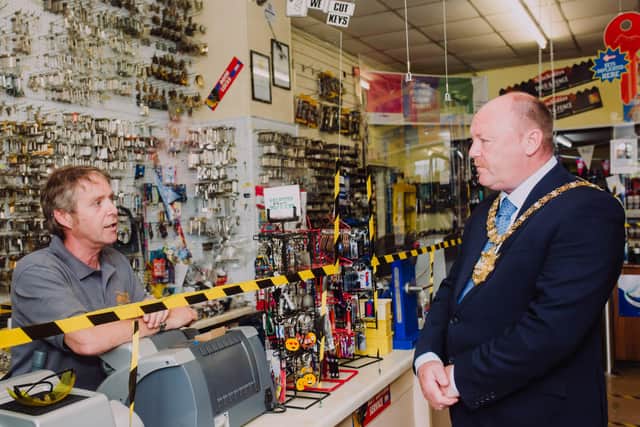 Lord Mayor of Belfast, Alderman Frank McCoubrey joined Anthony McCambridge at Castle Locksmiths on the Antrim Road in North Belfast as local retailers across the city begin to reopen their doors to customers