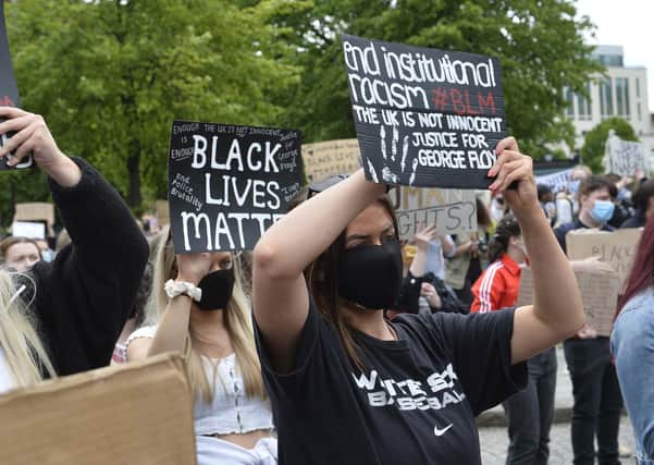 Anti-racism protestors at Belfast City Hall on June 3