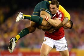 British and Irish Lions' George North tackles Australia's Isreal Folau in 2013 during the Second Test match at the Etihad Stadium, Melbourne. Pic by PA.