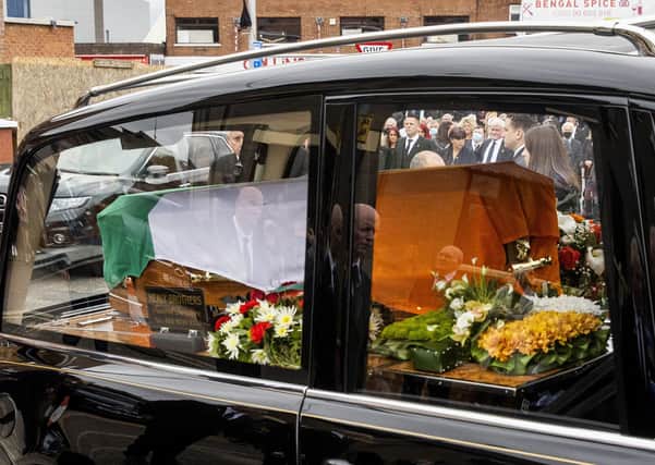 The coffin of senior Irish Republican and former leading IRA figure Bobby Storey arrives at St Agnes' Church in west Belfast ahead of his funeral