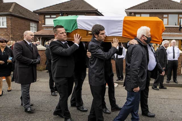 Members of the Storey family carry the coffin of senior Irish republican and former leading IRA figure Bobby Storey ahead of his funeral at St Agnes' Church in west Belfast.