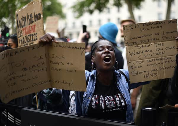 Demonstrators outside Downing Street in London on June 9, as the funeral of George Floyd takes place in the US. Photo: Victoria Jones/PA Wire