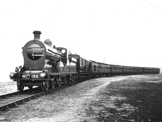 The Belfast to Kingstown Mail Train of the late 1910s and early 1920s with S class 4-4-0 No 172 "Slieve Donard" in charge.  The traveling post car is next to the locomotive.  Sister Locomotive No. 171 "Slieve Gullion" is now in the custody of the Railway Preservation Society of Ireland