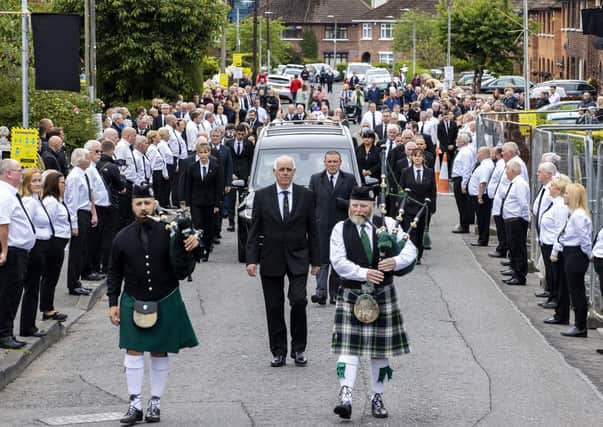 The funeral procession of senior Irish republican and former leading IRA figure Bobby Store arrives at St Agnes' Church in west Belfast.