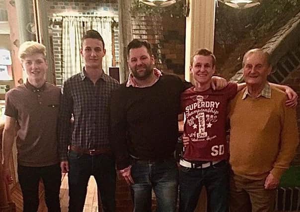 Ethan with his brothers, uncle and Grandfather.