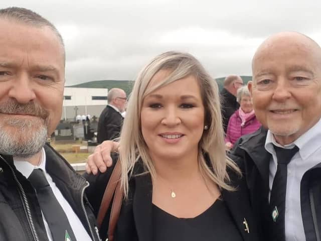 This ‘selfie’ where Michelle O’Neill stood smiling while a man had his arm around her was just one of at least nine breaches of her guidelines