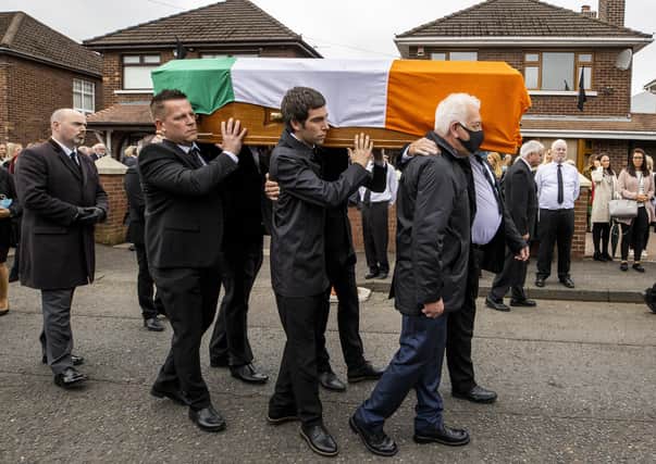 Members of the Storey family carry the coffin of senior Irish Republican and former leading IRA figure Bobby Storey ahead of his funeral at St Agnes' Church in west Belfast. (Photo: PA Wire)