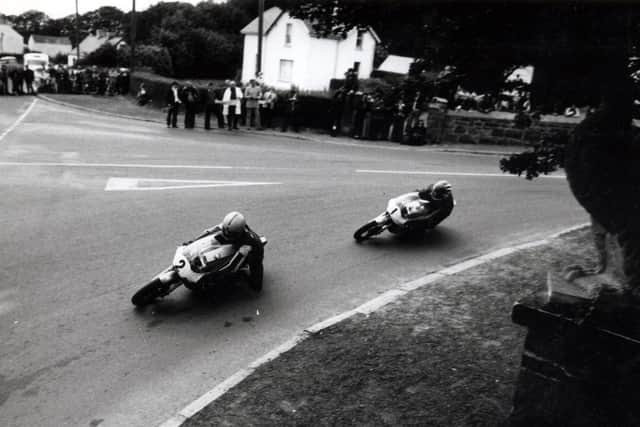 Joey Dunlop leads 'Dromara Destroyer' Ray McCullough during the 1977 season.