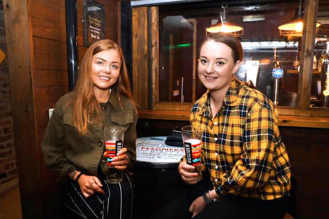 PACEMAKER PRESS BELFAST
3/7/2020
Pubs, cafes and restaurants in Northern Ireland welcome customers back today after easing of the lockdown restrictions imposed by Covid-19. 
Pictured are Kate and Carla having pints in Belfastâ€TMs Thirsty Goat.
Photo Pacemaker Press
