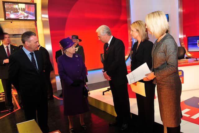 The Queen meets UTV broadcasters including Paul Clarke during her visit to Havelock House as they launch their new HD station there in 2010. Pic Colm Lenaghan/Pacemaker