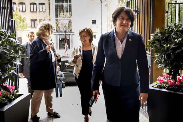 First Minister Arlene Foster (right) and Economy Minister Diane Dodds (centre) at the Merchant Hotel in Belfast to announce that weddings and baptisms can take place indoors from July 10