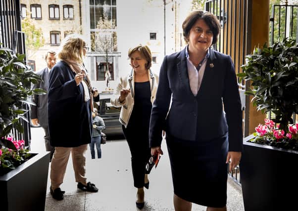 First Minister Arlene Foster (right) and Economy Minister Diane Dodds (centre) at the Merchant Hotel in Belfast to announce that weddings and baptisms can take place indoors from July 10