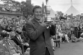 Australian golfer Peter Thomson with the trophy in 1956 after winning the Open Golf Championship for the third time in a row. Pic by PA.