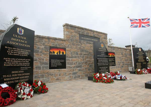 The Department of Social Development part-funded a "garden of reflection" in Bangor in which loyalist paramilitaries are honoured.
The project in the Kilcooley estate was supposed to be linked to the removal of loyalist murals and graffiti.
Three black stones bear inscriptions dedicated to the "glorious memory" of the UDA, UVF, and Red Hand Commando.
The DSD said in 2009 that the paramilitary plinths were "not in accordance" with the plans it agreed with the Housing Executive. (Photo: Pacemaker).