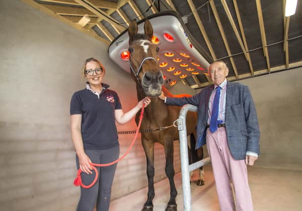 Gillian Patterson from Hagans Croft Equestrian shows Alderman Jim Dillon MBE, Development Committee Chairman the new solarium that was purchased with the grant provided through the TRPSI programme