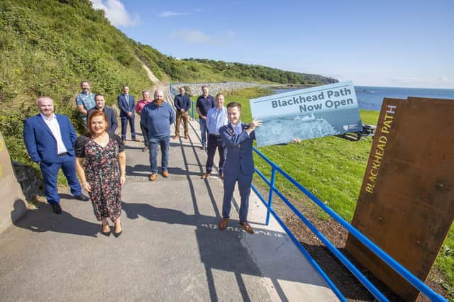 Represenatives from council and FP McCann attend the path reopening