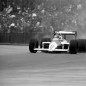 Ayrton Senna in his McLaren Honda on his way to victory in a rain lashed British Grand Prix at Silverstone