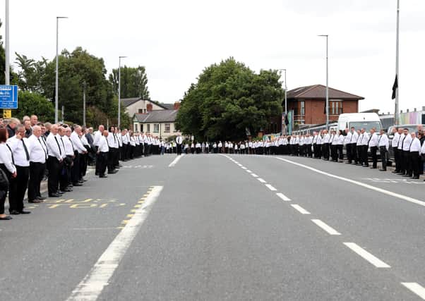 A typically republican funeral in which nearly 2,000 individuals were dressed in black trousers and white shirts