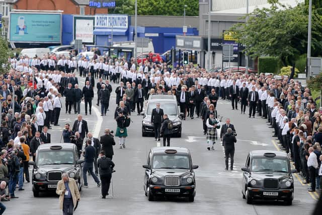 The PSNI closed off traffic for the procession in what John Bruton describes as "the paramilitary style funeral of Bobby Storey in Belfast"