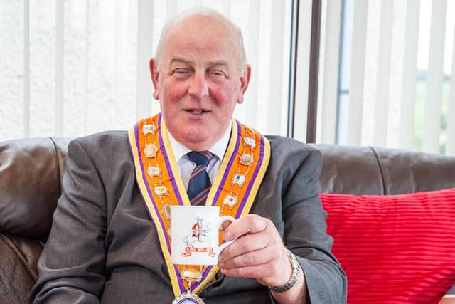 Grand Master of the Grand Orange Lodge of Ireland, Edward Stevenson, prepares for the Twelfth of July celebrations at home
