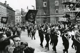 The July 12 parade of 1960 passes BBC Broadcasting House as it makes its way down the Dublin Road in Belfast