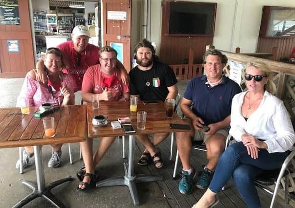 Celebrating July 12 2020 in Antigua. From left to right: Helen and Rick Bell from Canada, William Cudworth from Bangor, Matti McFall from Donaghadee, Michael Ryan from Miami and Megan from Los Angeles