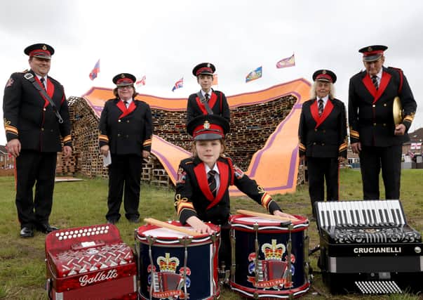 Three generations of the Duprey family, all members of Derryfubble Accordion Band, were playing in Portadown with Edgarstown Accordion Band. From left: David, Kathy, William, Betty and Robert, with Sarah in front