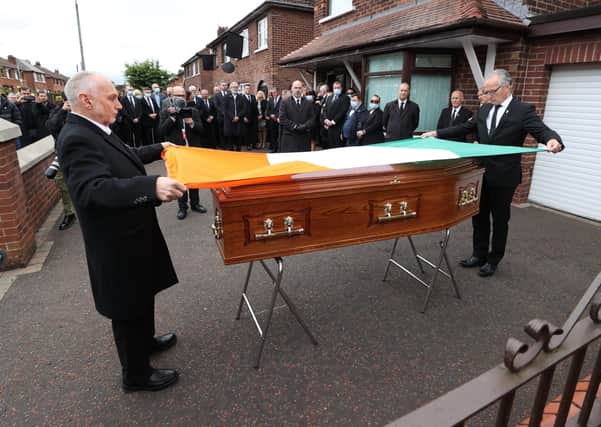Gerry Kelly MLA (right) at the funeral of veteran republican Bobby Storey last month