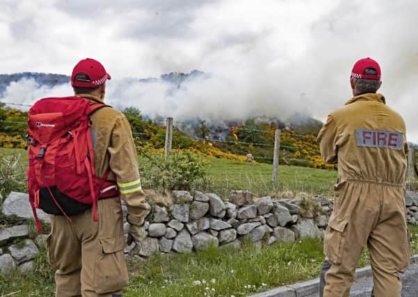 The fire brigade at a wild fire at Dollys Brae near Castlewellan in May,which has been burning continously for 48 hours. Picture C Kinahan/McAuley Multimedia