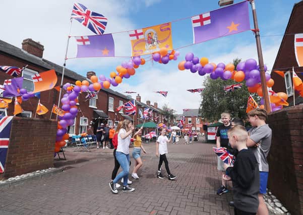 Twelfth celebrations in Beechfield Street Belfast, where people were advised to celebrate where they lived due to the coronavirus outbreak, and to watch parades from home. Photo: Niall Carson/PA Wire