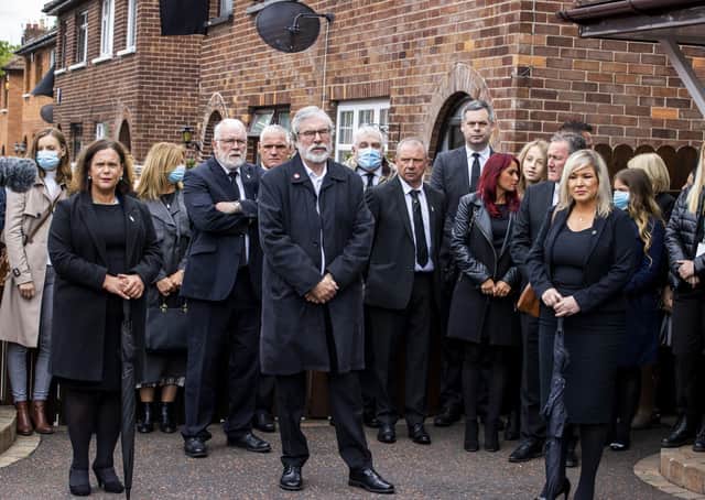 (left to right) Sinn Fein leaders Mary Lou McDonald, Gerry Adams, and Michelle O'Neill alongside other senior members of the party and other mourners at the funeral of the IRA man Bobby Storey. Photo: Liam McBurney/PA Wire