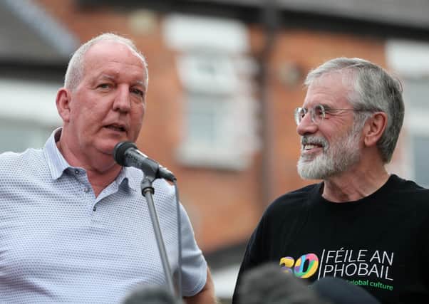 Bobby Storey in 2018 with Gerry Adams