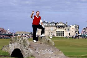 USA's Jack Nicklaus waves to the crowds on the eighteenth hole  at St Andrews in 2005.